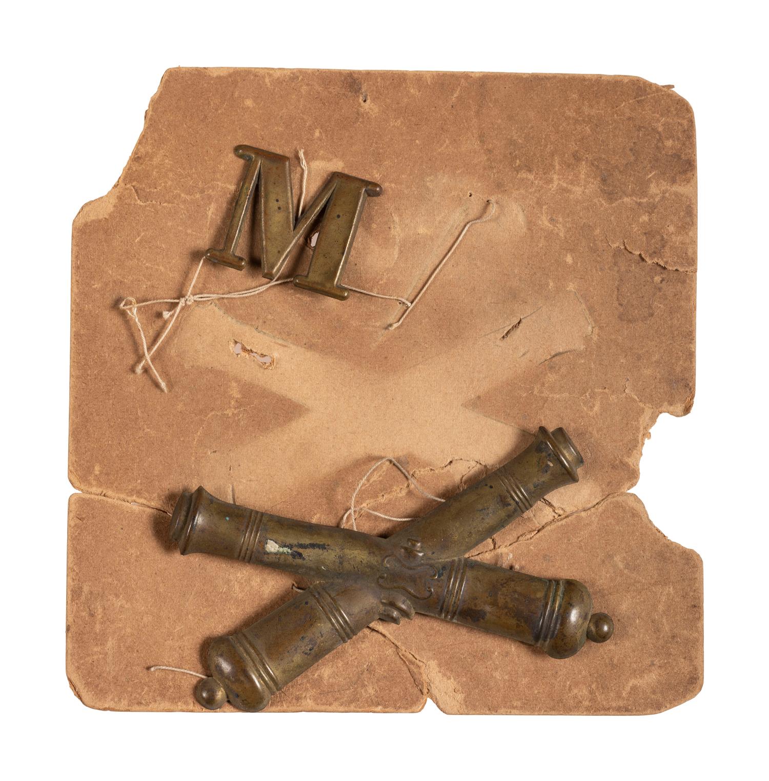 Civil War artillery and company insignia displayed on vintage pasteboard.