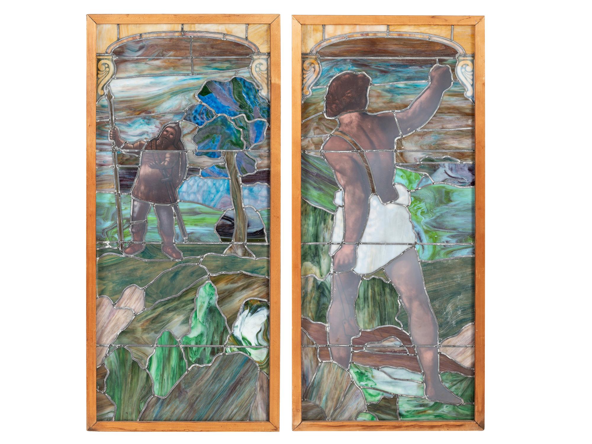 A Pair of Stained and Painted Glass Panels