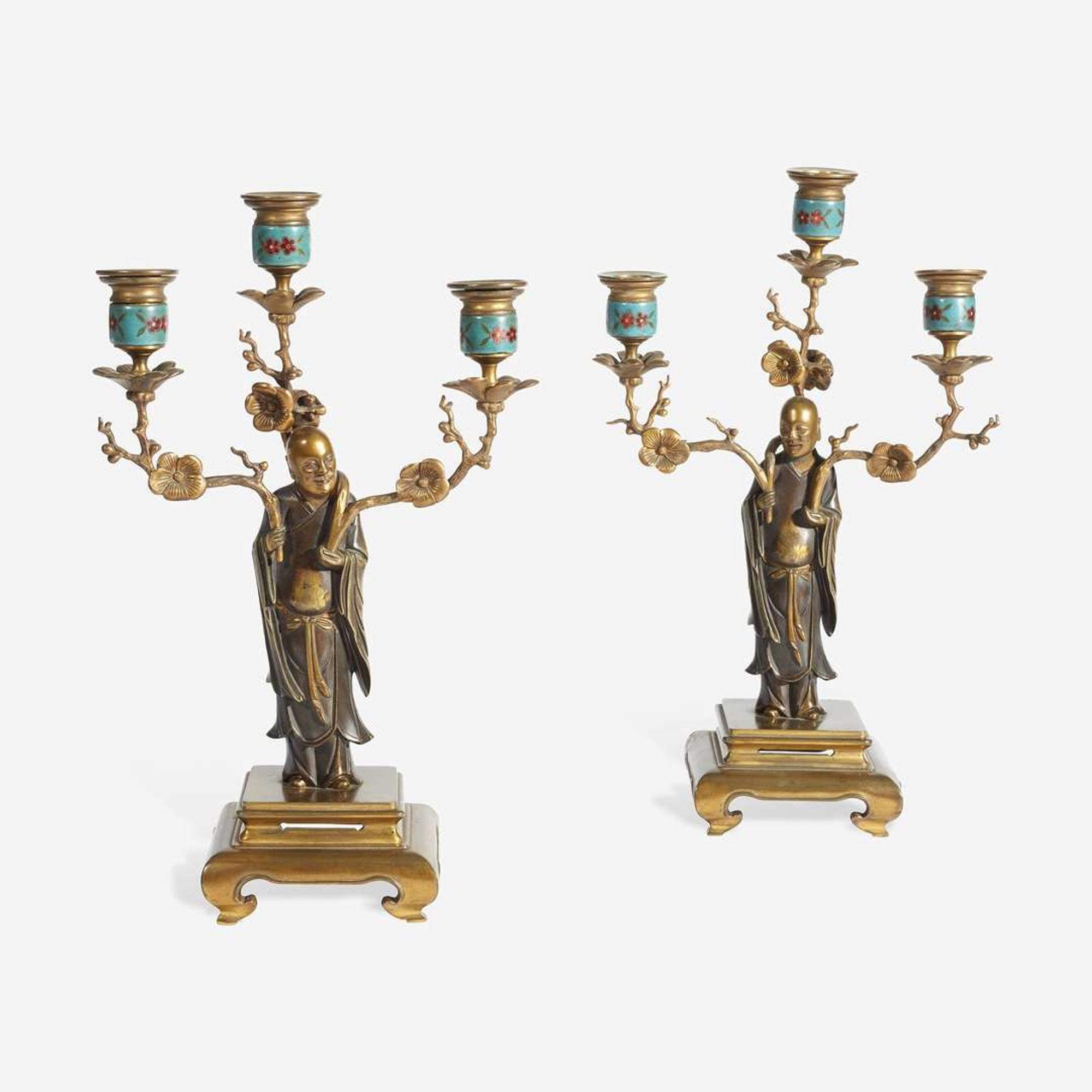 A Pair of French Enameled and Gilt Metal Figural Candelabra Early 20th century