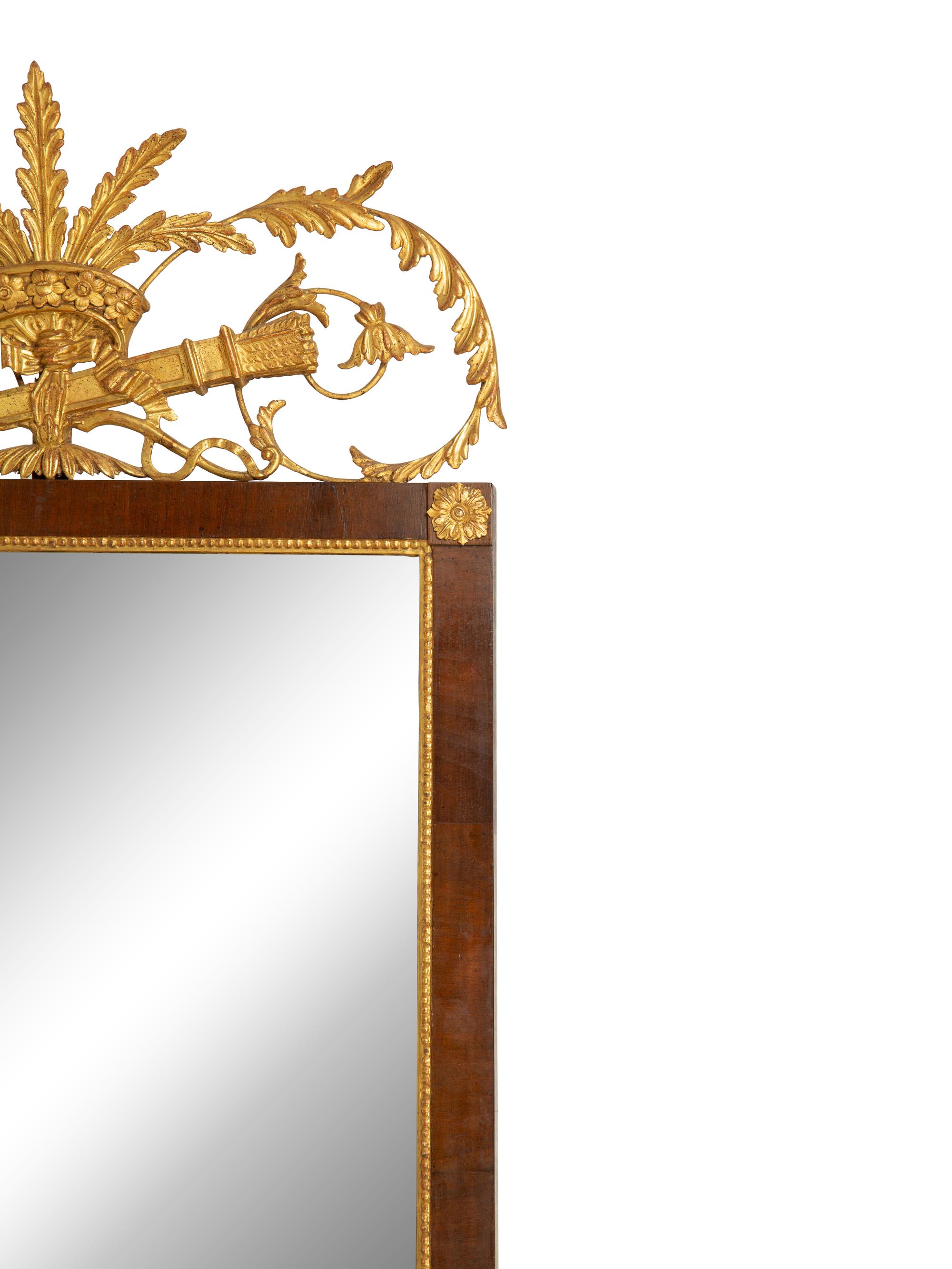An Italian Neoclassical Style Giltwood and Mahogany Mirror