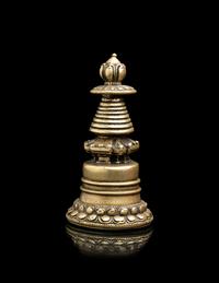 A Small Tibetan Bronze Pala-Style Model of a Stupa