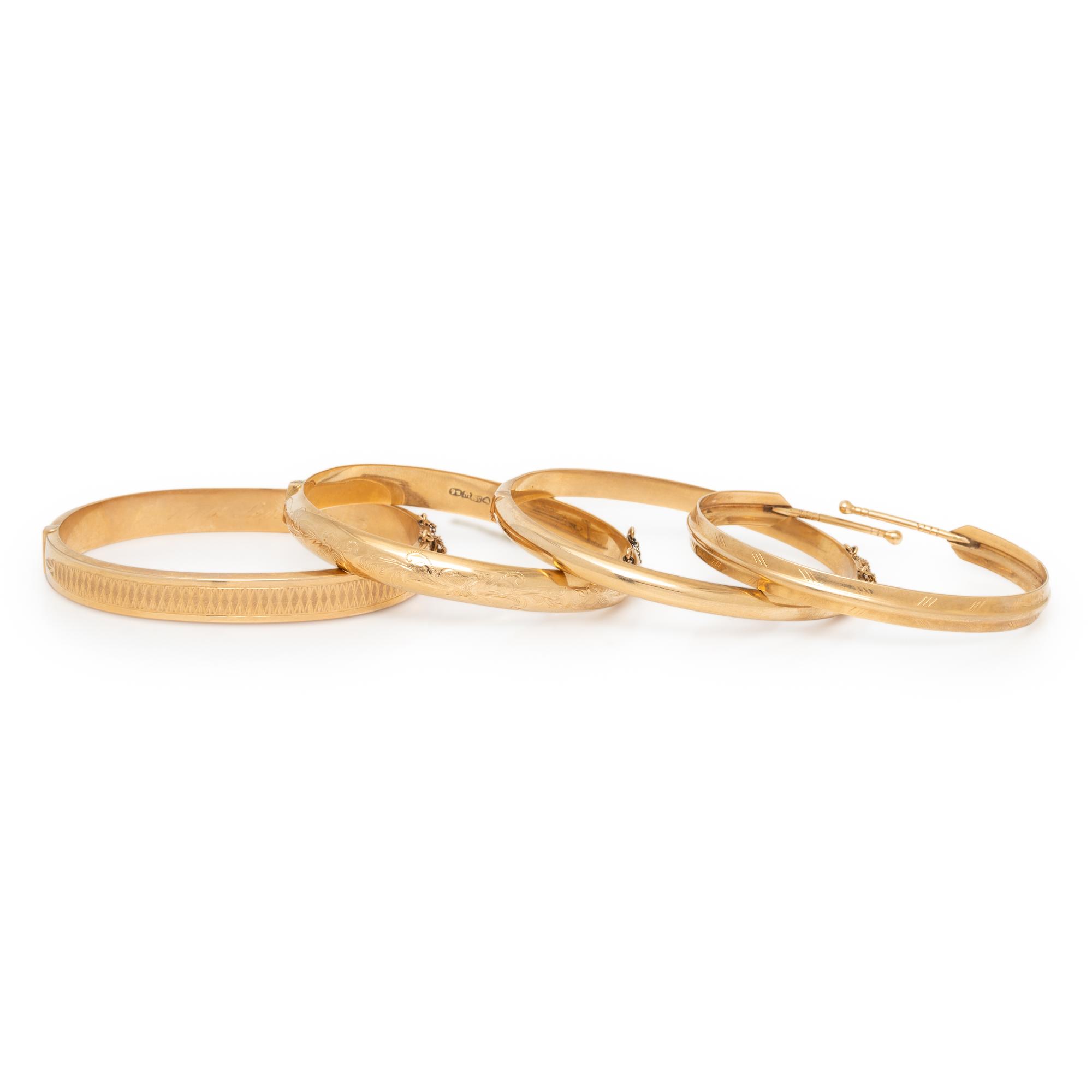 FINNISH, COLLECTION OF FOUR YELLOW GOLD BANGLE BRACELETS