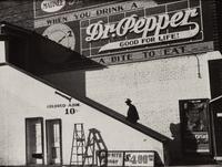 A group of five photographs ( A member of the Wilkins Family Making Biscuits , 1939; Post Office in Blizzard, Aspen, CO , 1941; Negro (Black) Man Entering Movie Theater by Colored Entrance, Belzoni, Miss., 1939; Crossroad and General Store (Mosquito Crossing) Near Greensboro, GA, 1939 (printed 1981); Recreation Evening at Community School Under Direction of WPA Recreational Supervisor (in suit and tie) Coffee County, Alabama, 1939)
