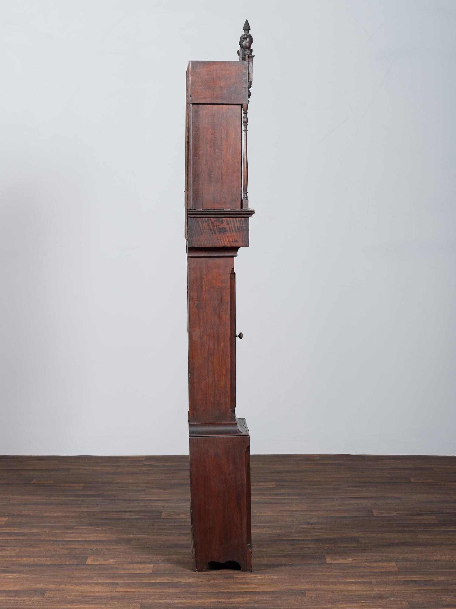 A Chippendale Cherrywood and Tiger Maple Tall Case Clock