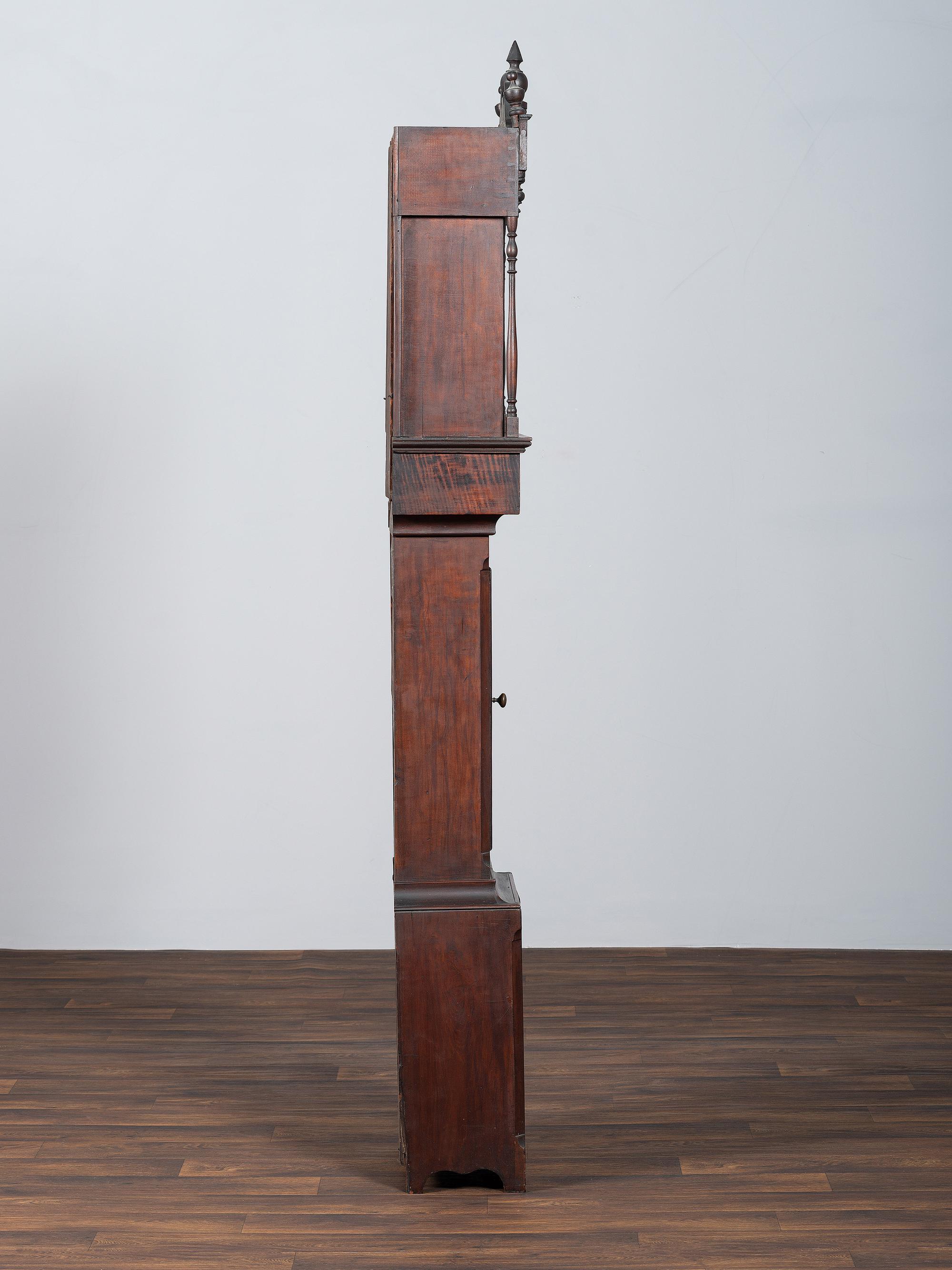 A Chippendale Cherrywood and Tiger Maple Tall Case Clock