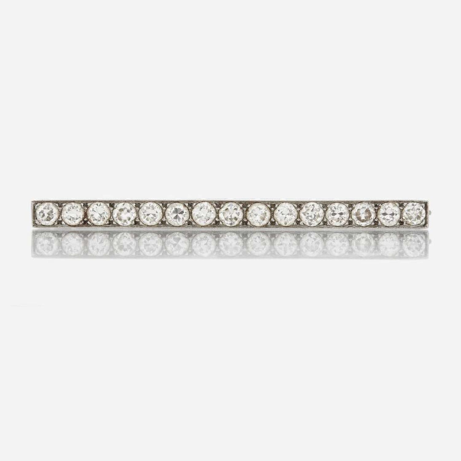 An antique diamond and platinum brooch