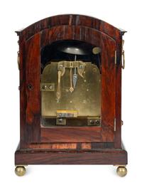A Regency Rosewood and Brass-Inlaid Mantel Clock
