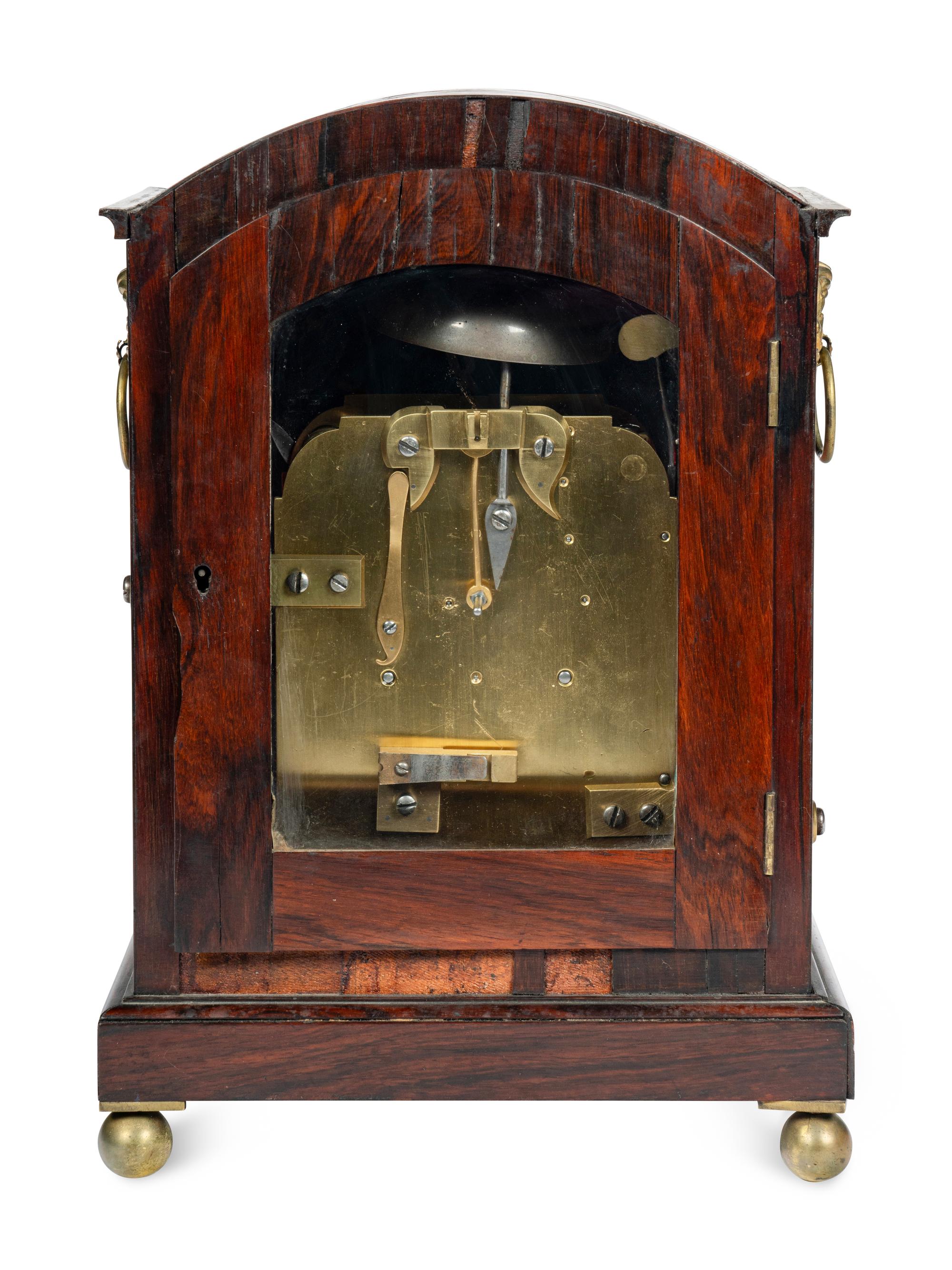 A Regency Rosewood and Brass-Inlaid Mantel Clock