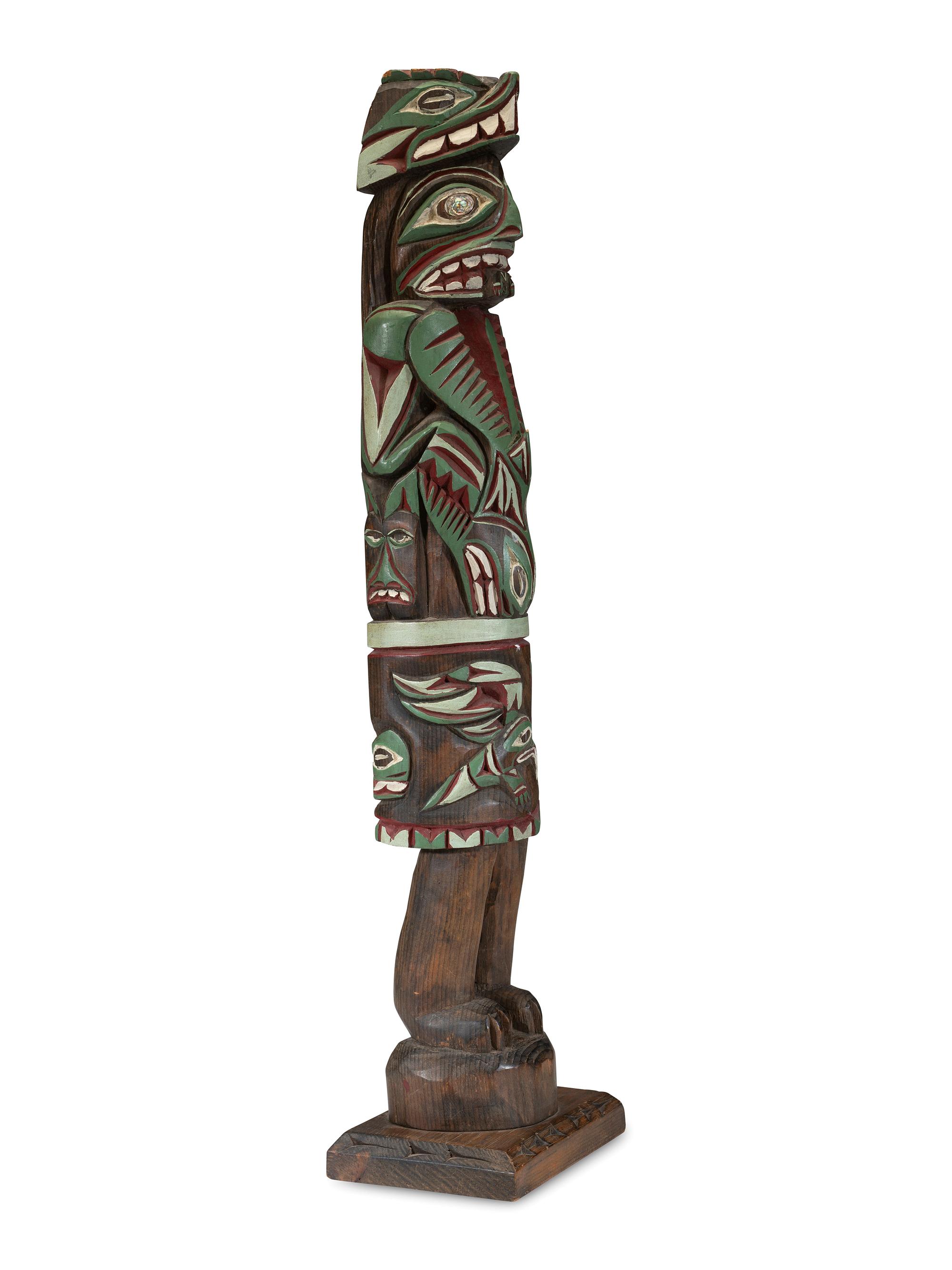 A Carved Totemic Figure, In the Northwest Coast Style