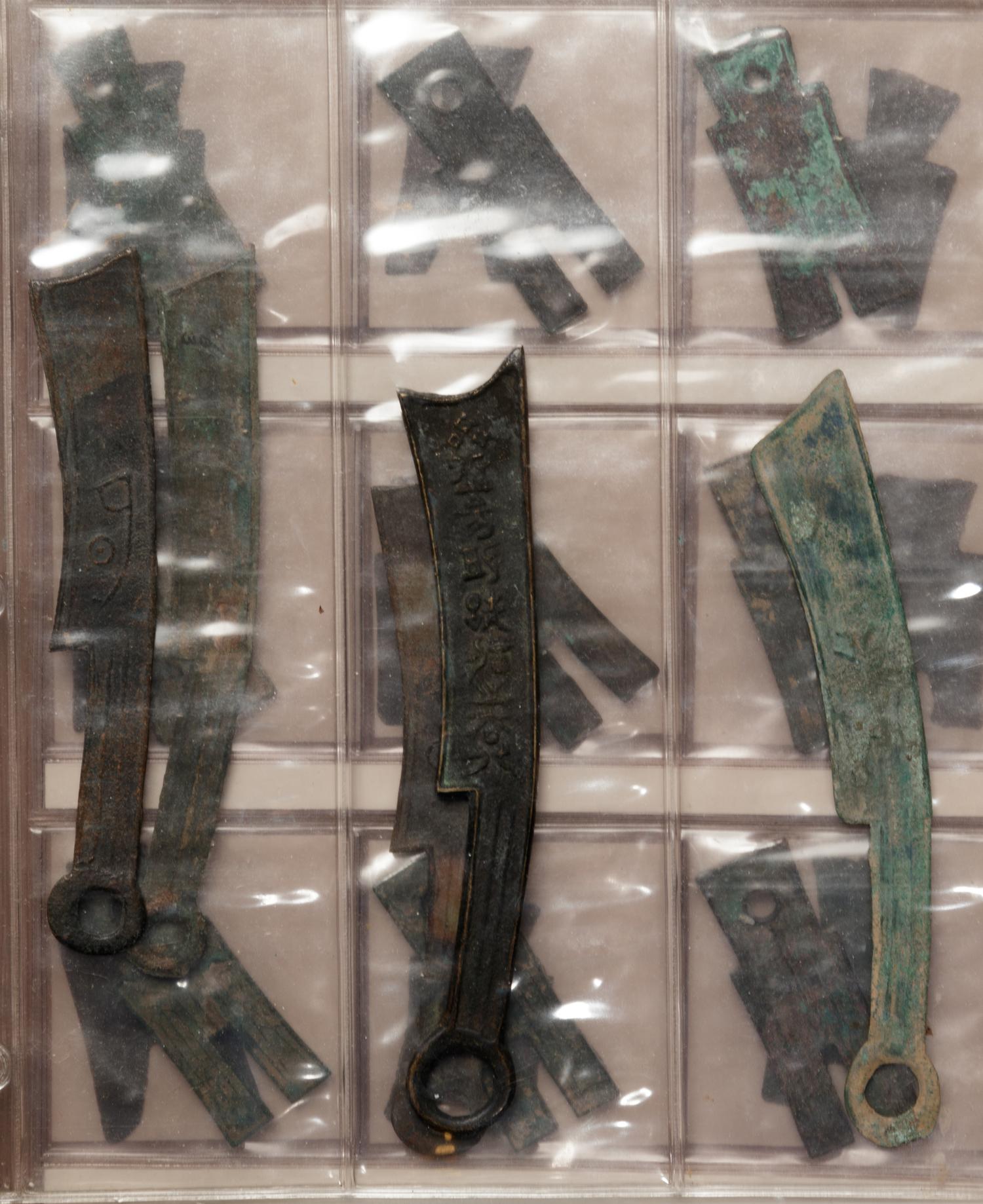 A Large Collection of Chinese Coins and Pendants