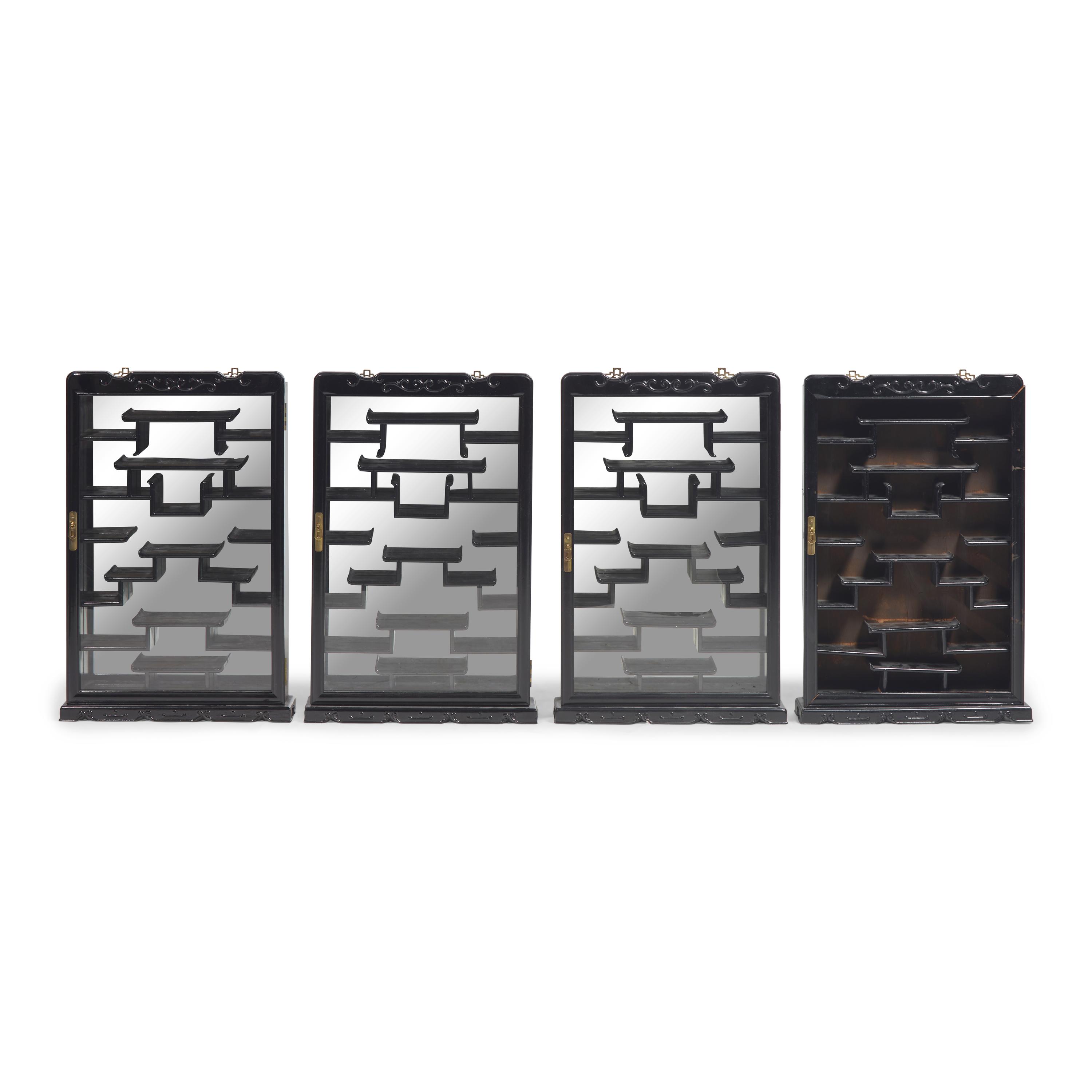 An Associated Set of Four Chinese Ebonized Wood Hanging Vitrines, 20th Century 近代 硬木多寶格挂屏一組四件