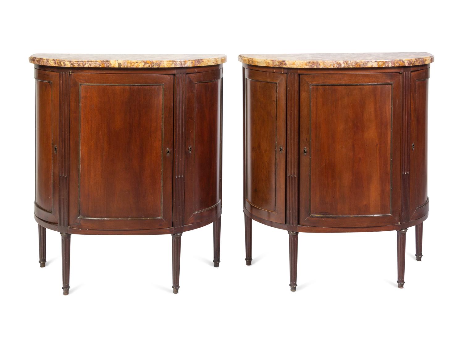 A Pair of Louis XVI Style Mahogany Marble-Top Cabinets