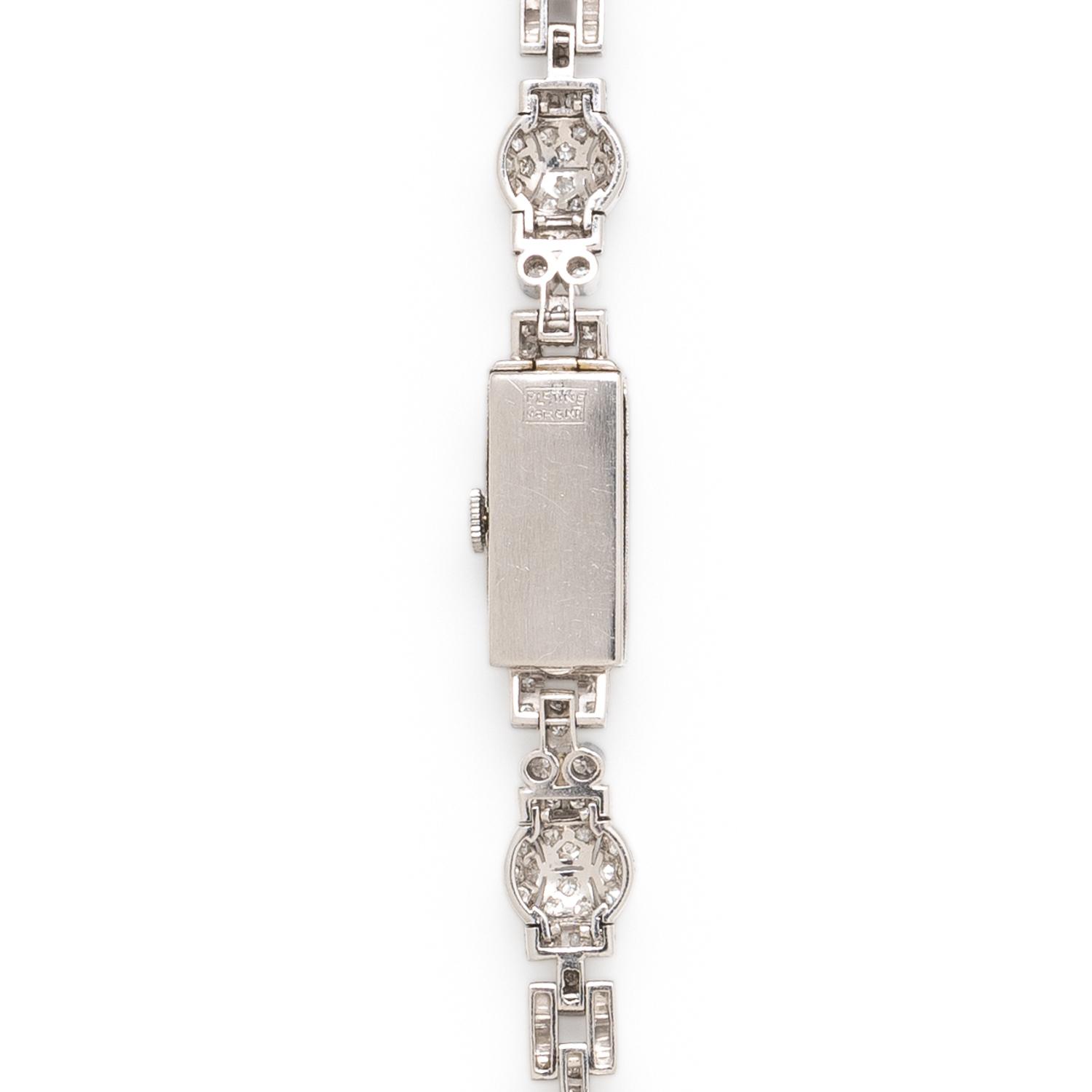 GENEVE, ART DECO, DIAMOND AND PLATINUM WATCH
