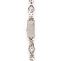 GENEVE, ART DECO, DIAMOND AND PLATINUM WATCH