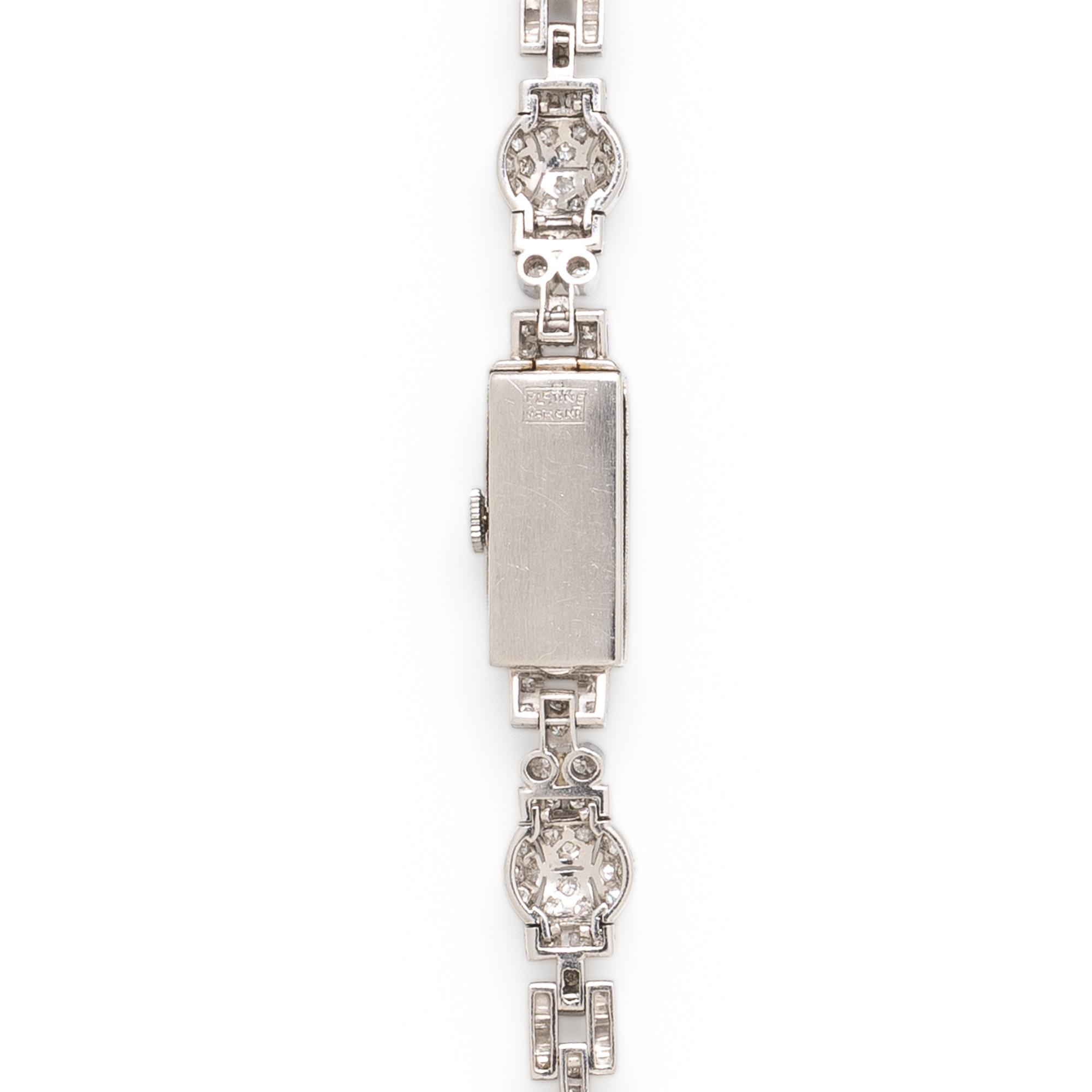 GENEVE, ART DECO, DIAMOND AND PLATINUM WATCH