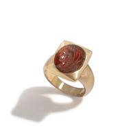 A Roman Carnelian Ring Stone with the Goddess Isis — Set in a gold ring
