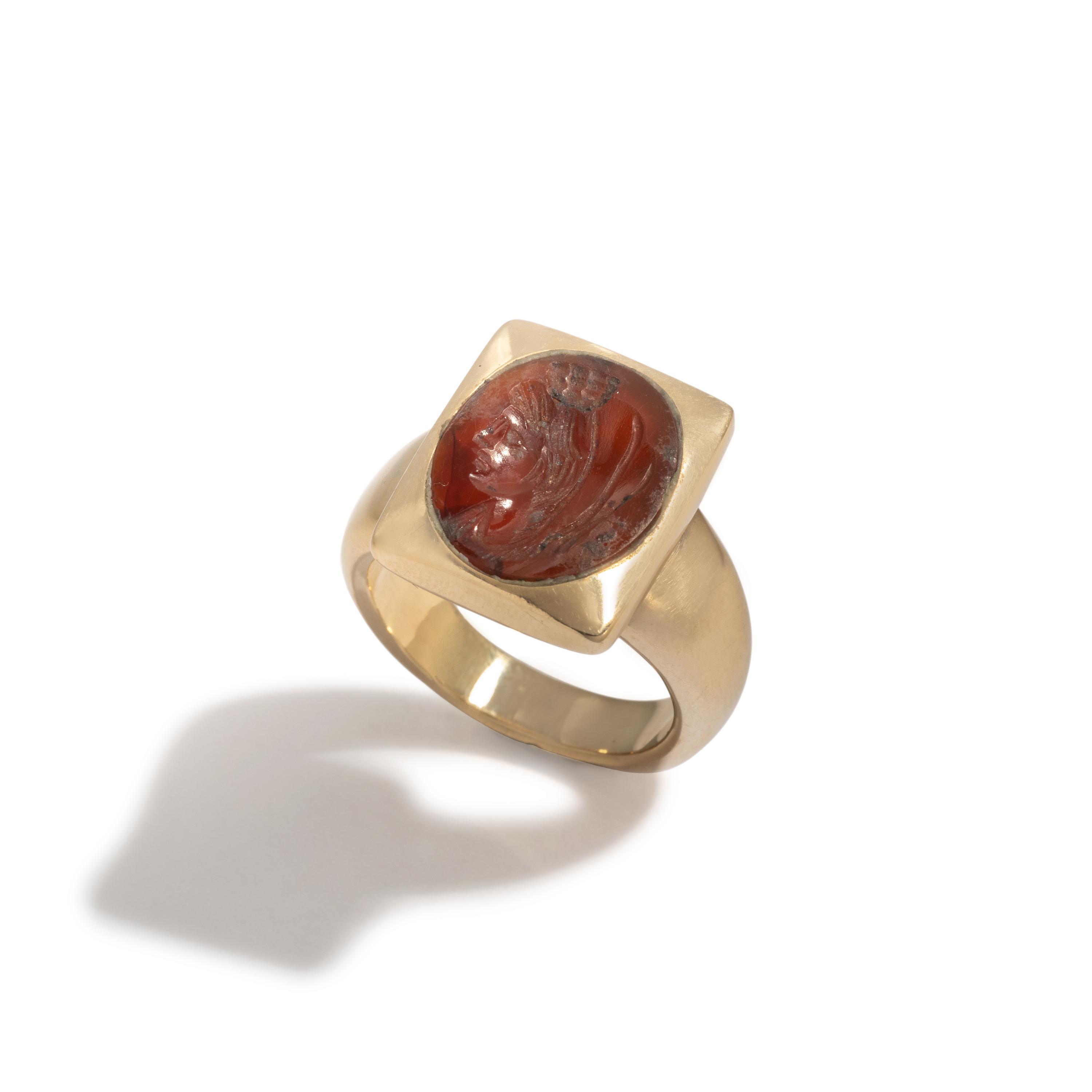 A Roman Carnelian Ring Stone with the Goddess Isis — Set in a gold ring