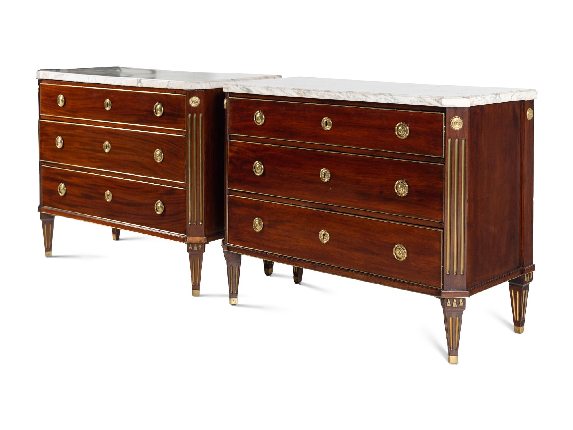 A Pair of Swedish Neoclassical Gilt Metal Mounted Mahogany Marble-Top Commodes