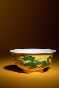 A Green Enameled Yellow Ground Porcelain 'Dragon' Bowl
