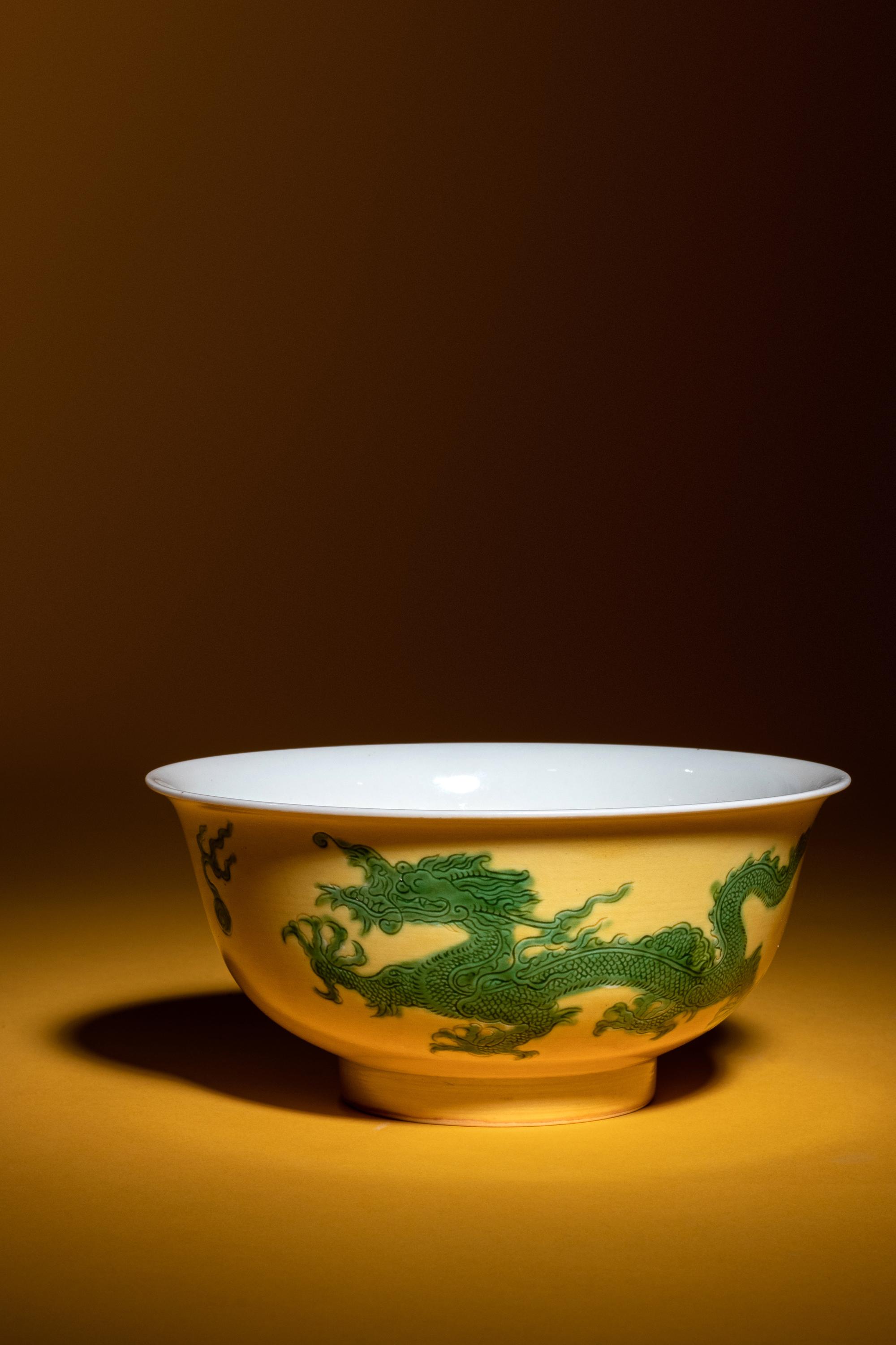 A Green Enameled Yellow Ground Porcelain 'Dragon' Bowl