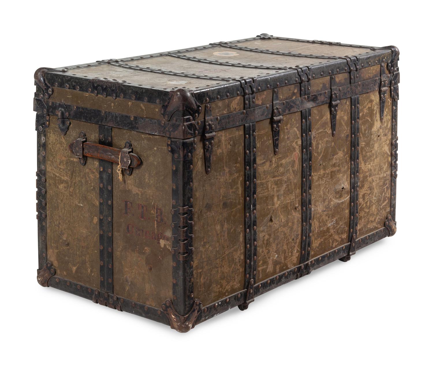 A Leather and Iron Steamer Trunk