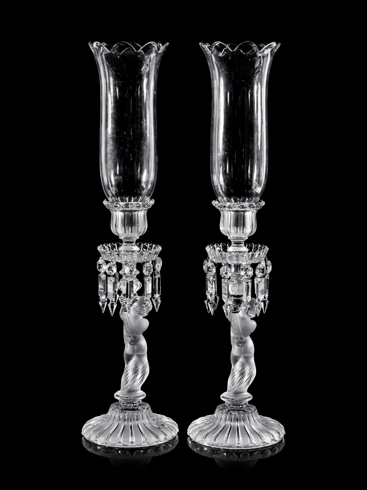 A Pair of Baccarat Glass Figural Candlesticks