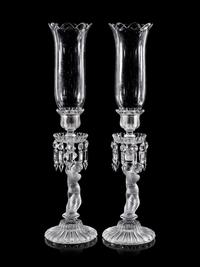 A Pair of Baccarat Glass Figural Candlesticks
