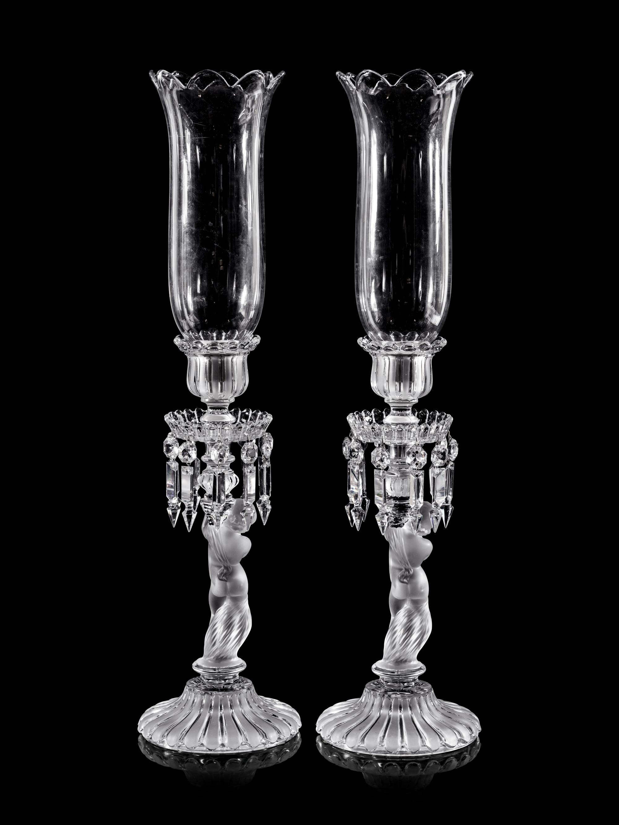 A Pair of Baccarat Glass Figural Candlesticks