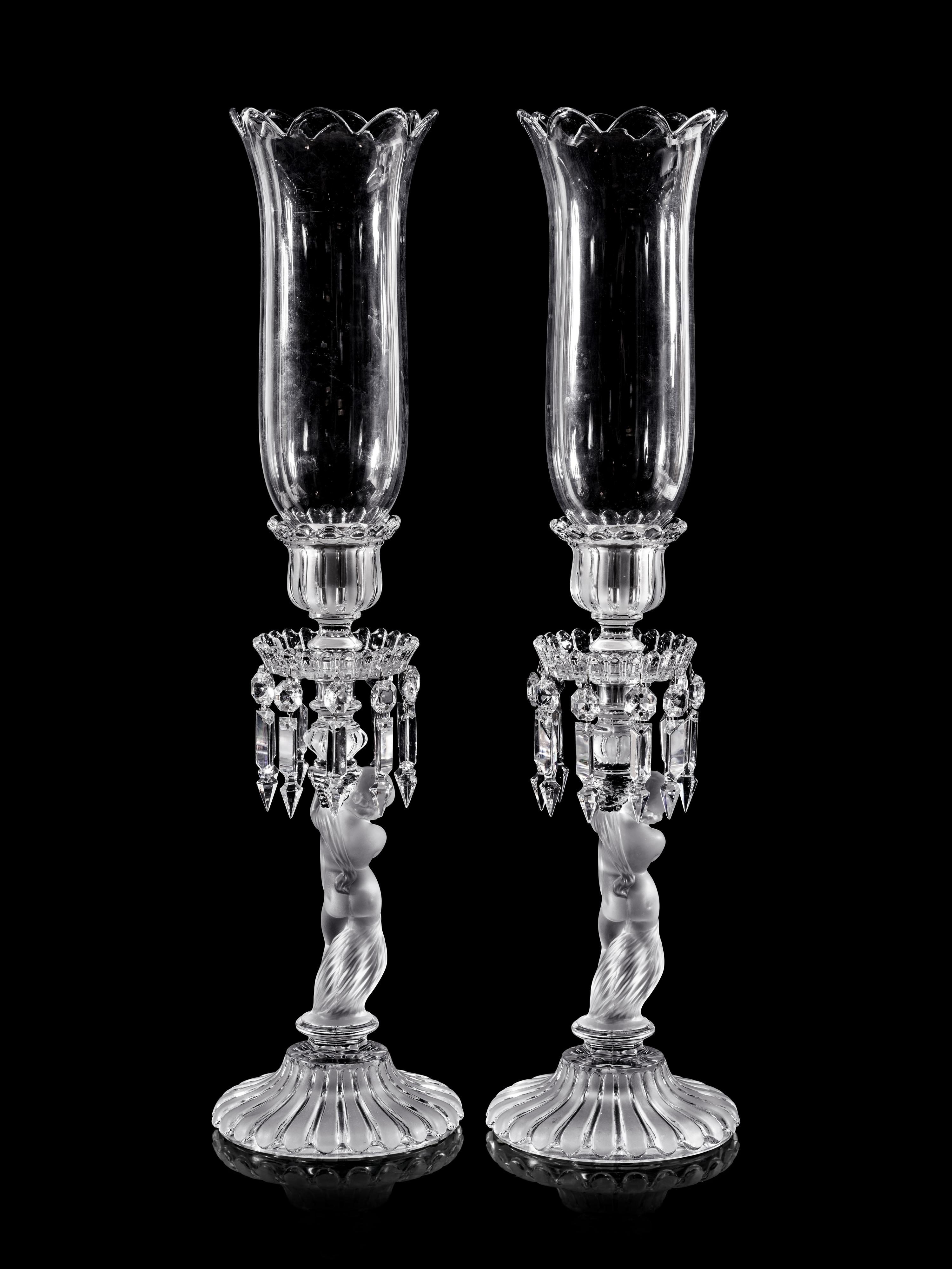 A Pair of Baccarat Glass Figural Candlesticks