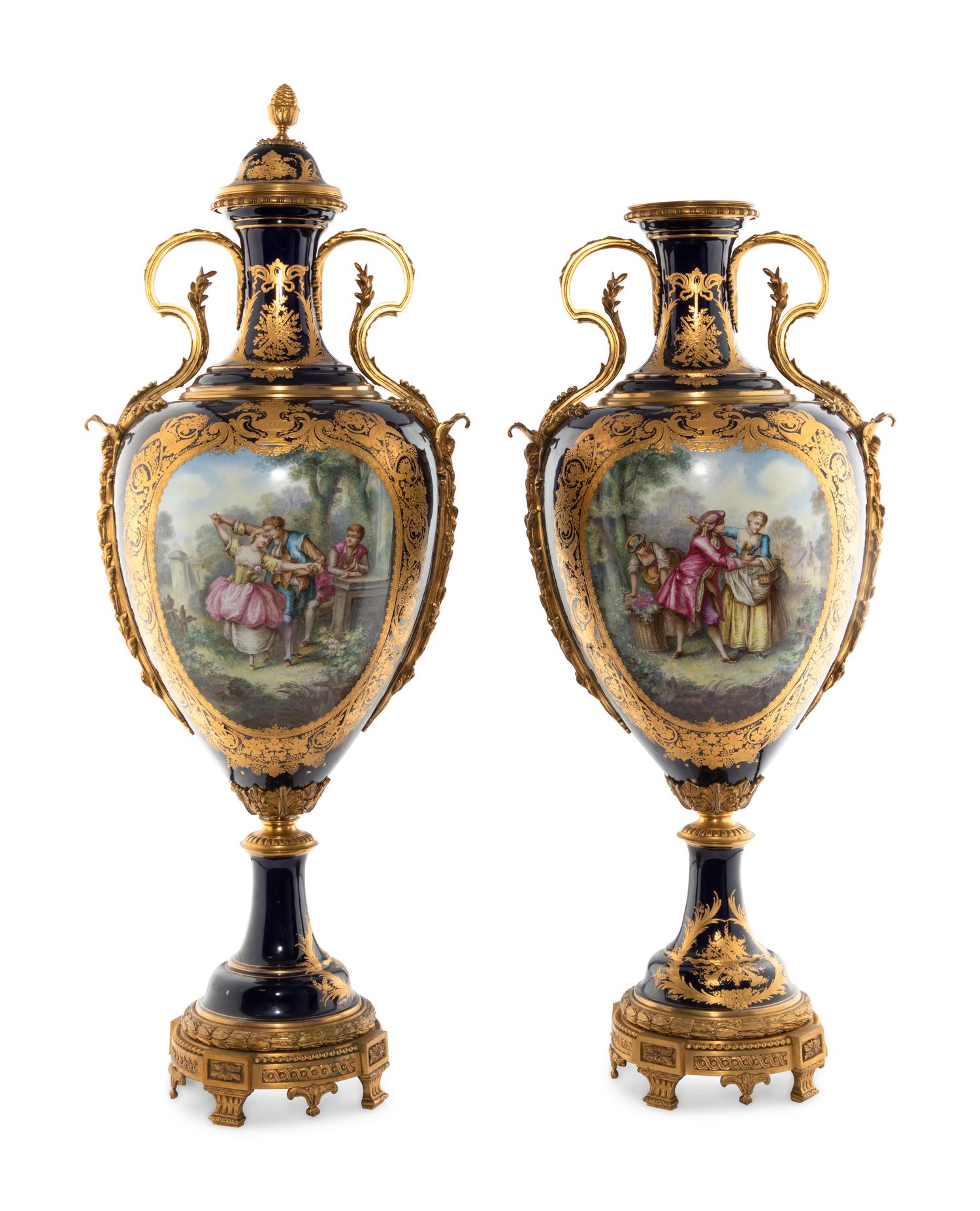 A Pair of Gilt Bronze Mounted Sèvres Style Porcelain Urns