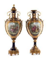A Pair of Gilt Bronze Mounted Sèvres Style Porcelain Urns