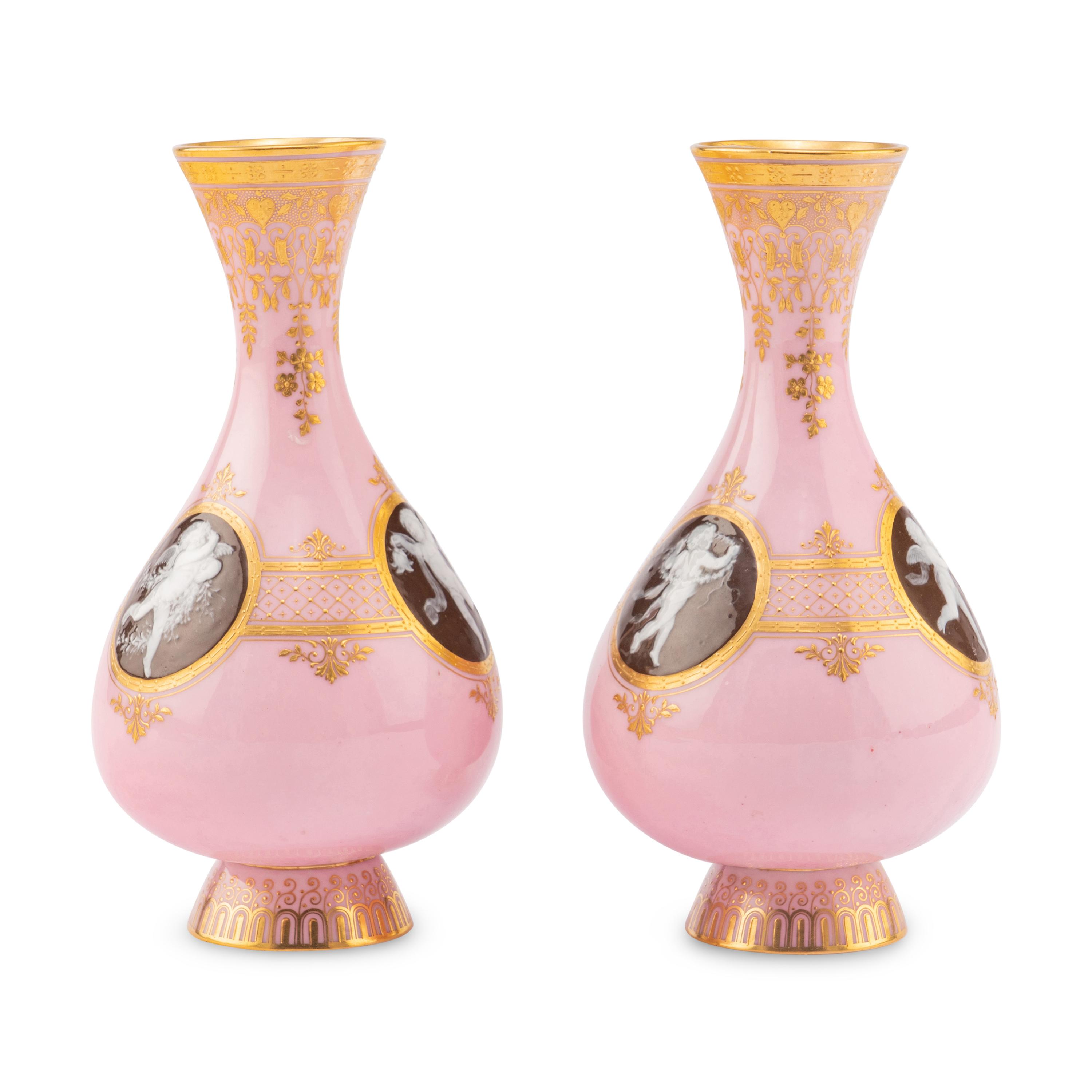 A Pair of Minton Pâte-sur-Pâte Pink Ground Bottle Vases