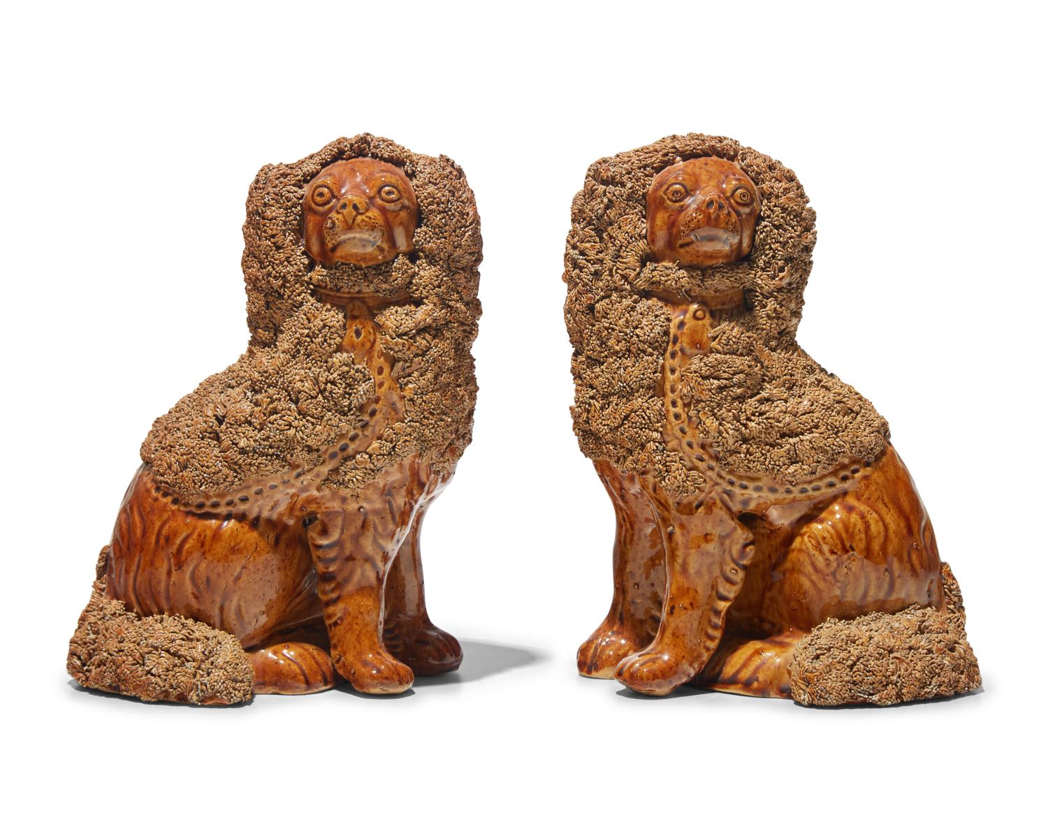A Scarce Pair of Rockingham Glazed Spaniels