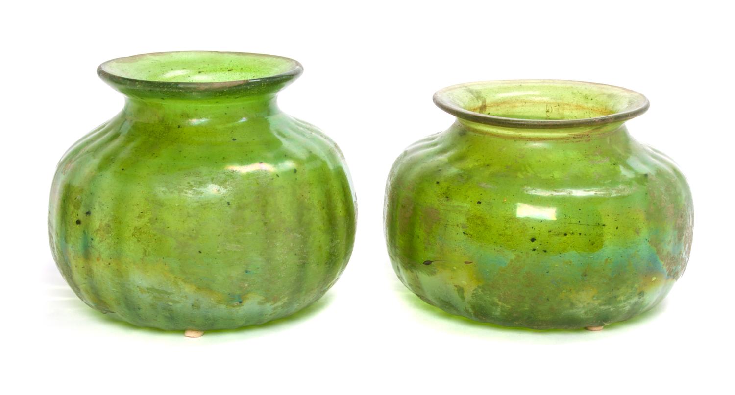 A Near Pair of Iridescent Glass Vases Diameter of larger 9 1/2 inches.