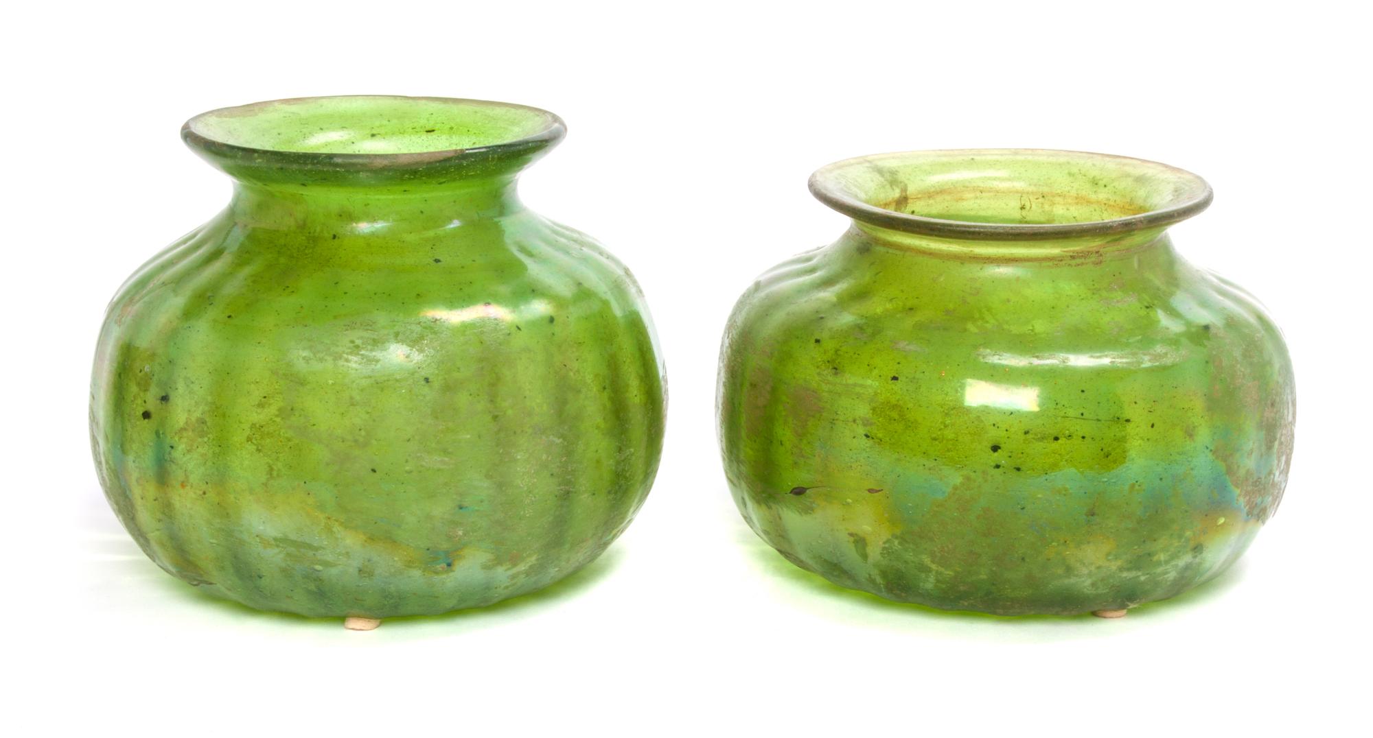 A Near Pair of Iridescent Glass Vases Diameter of larger 9 1/2 inches.