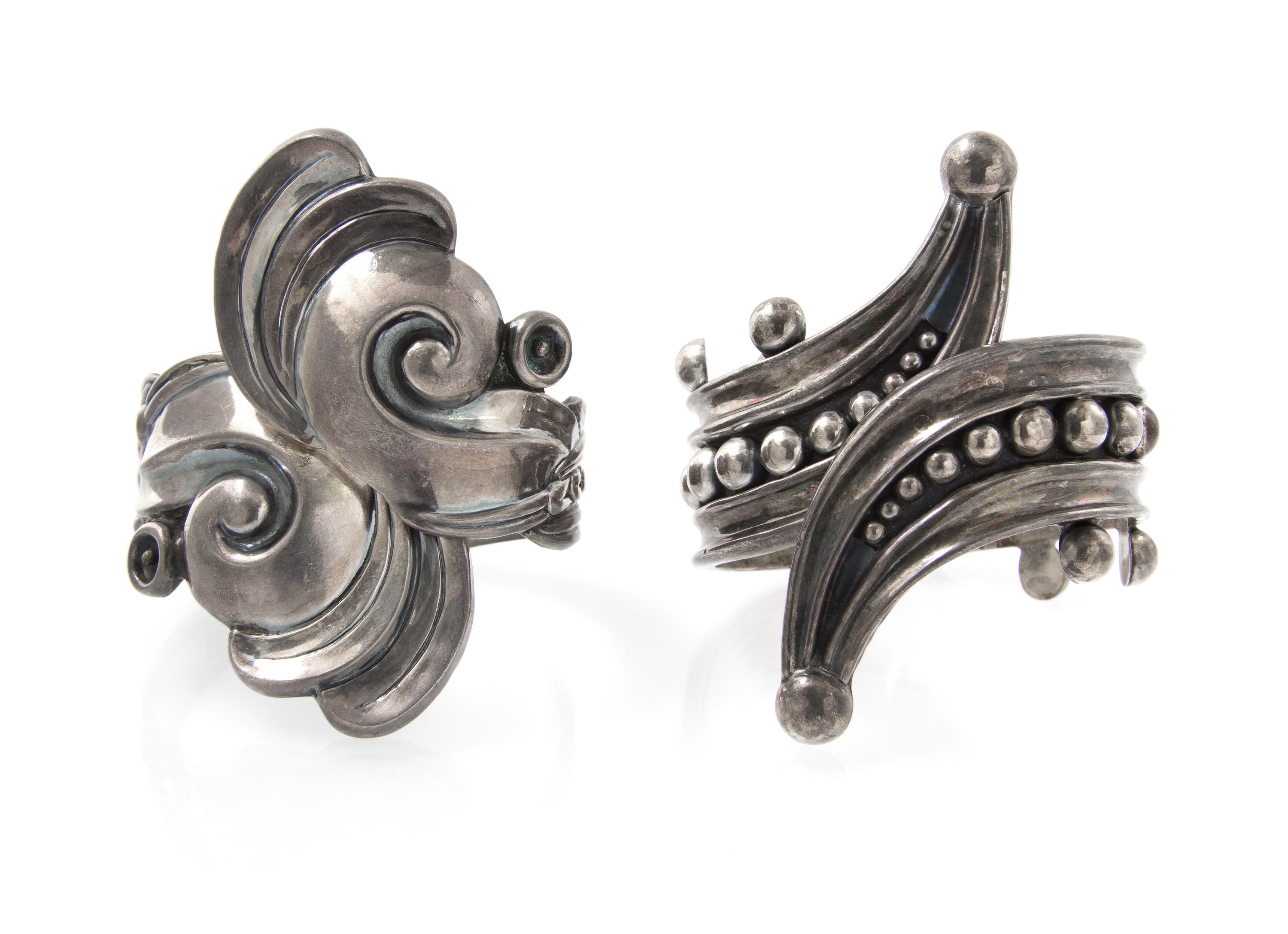 A Collection of Sterling Silver Bypass Hinged Bracelets, Taxco, 62.60 dwts.