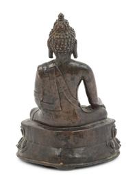 A Tibetan Bronze Figure of Seated Buddha Akshobhya