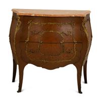 A Louis XV Style Gilt Bronze Mounted Marble Top Bombe Commode