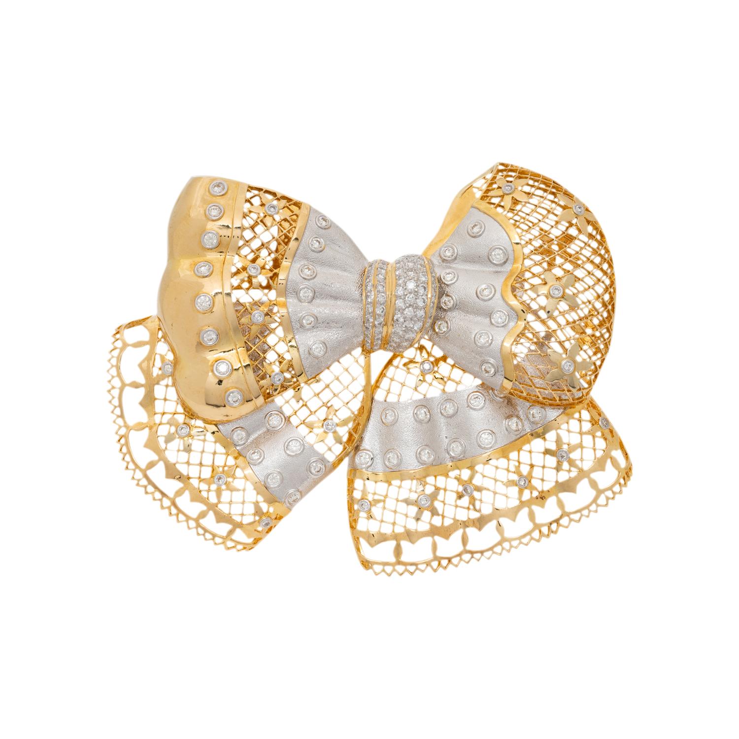 BICOLOR GOLD AND DIAMOND BOW BROOCH