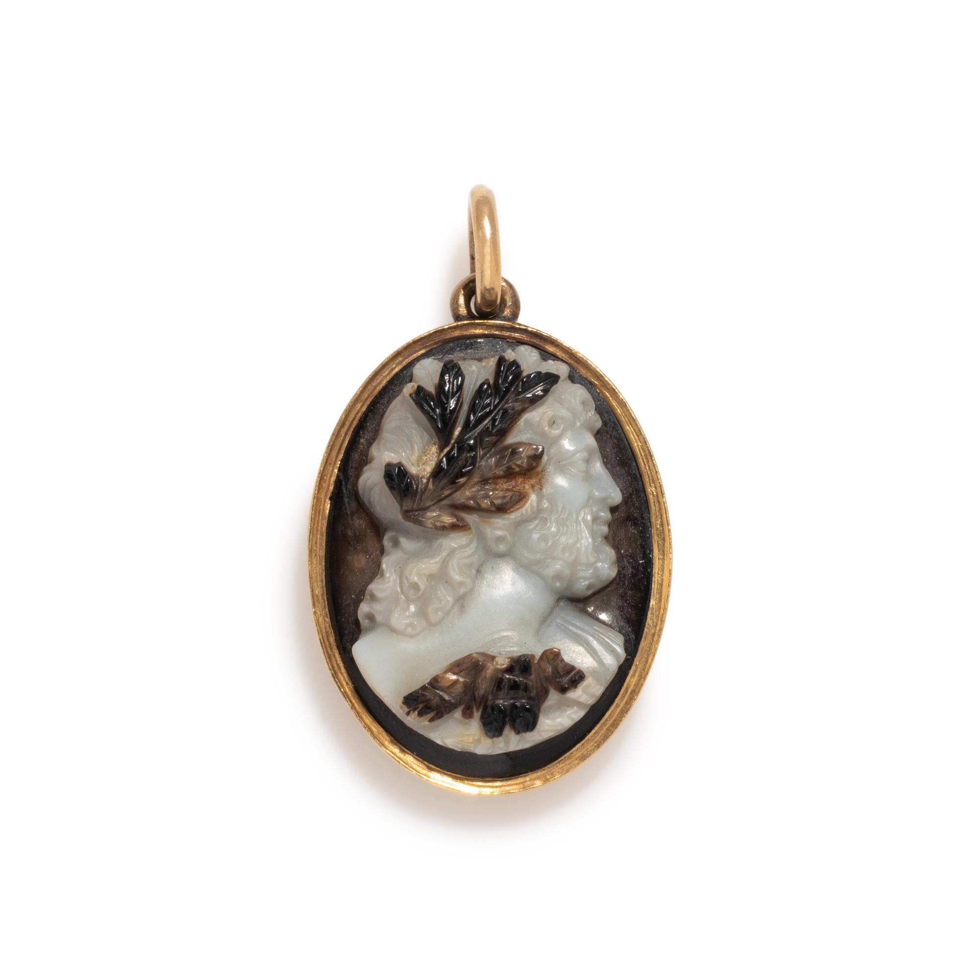 A Neoclassical Gold and Sardonyx Cameo Brooch with the God Jupiter