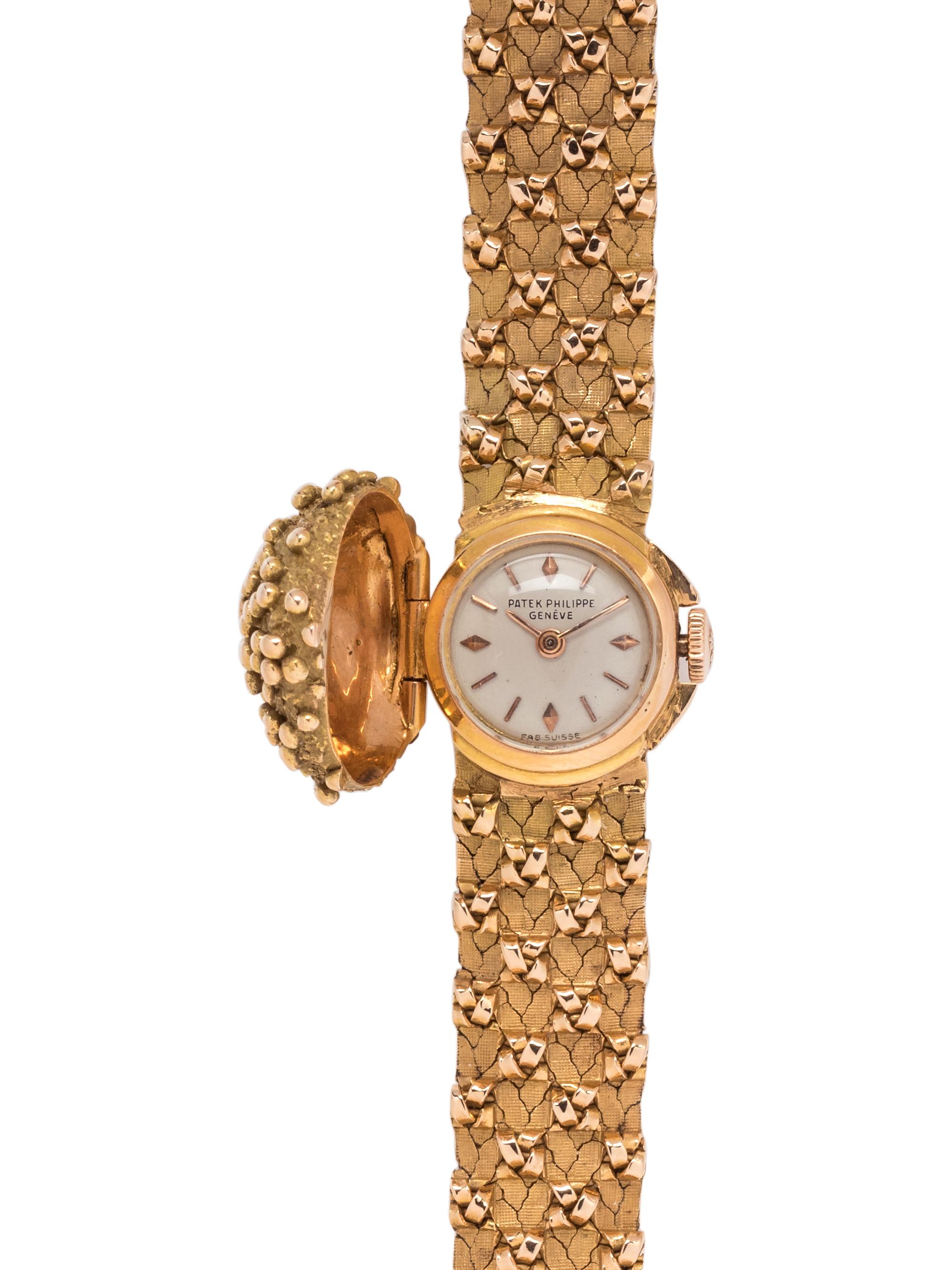 PATEK PHILIPPE, 18K YELLOW GOLD SURPRISE WRISTWATCH