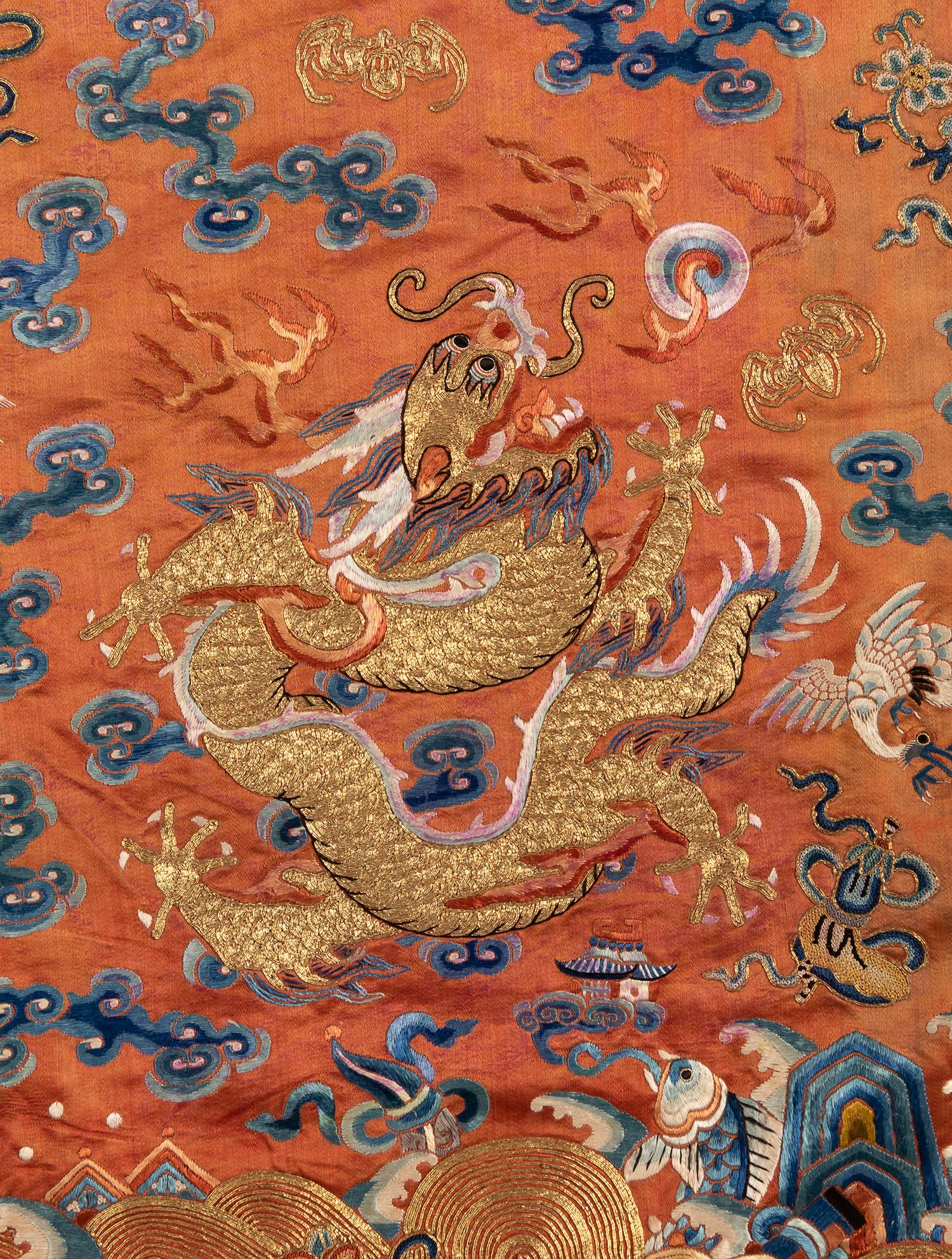 A Apricot Ground Embroidered Silk 'Dragon' Robe, Jifu