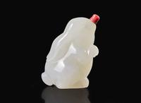 A Chinese carved white jade "Rabbit" snuff bottle 白玉兔型鼻煙壺