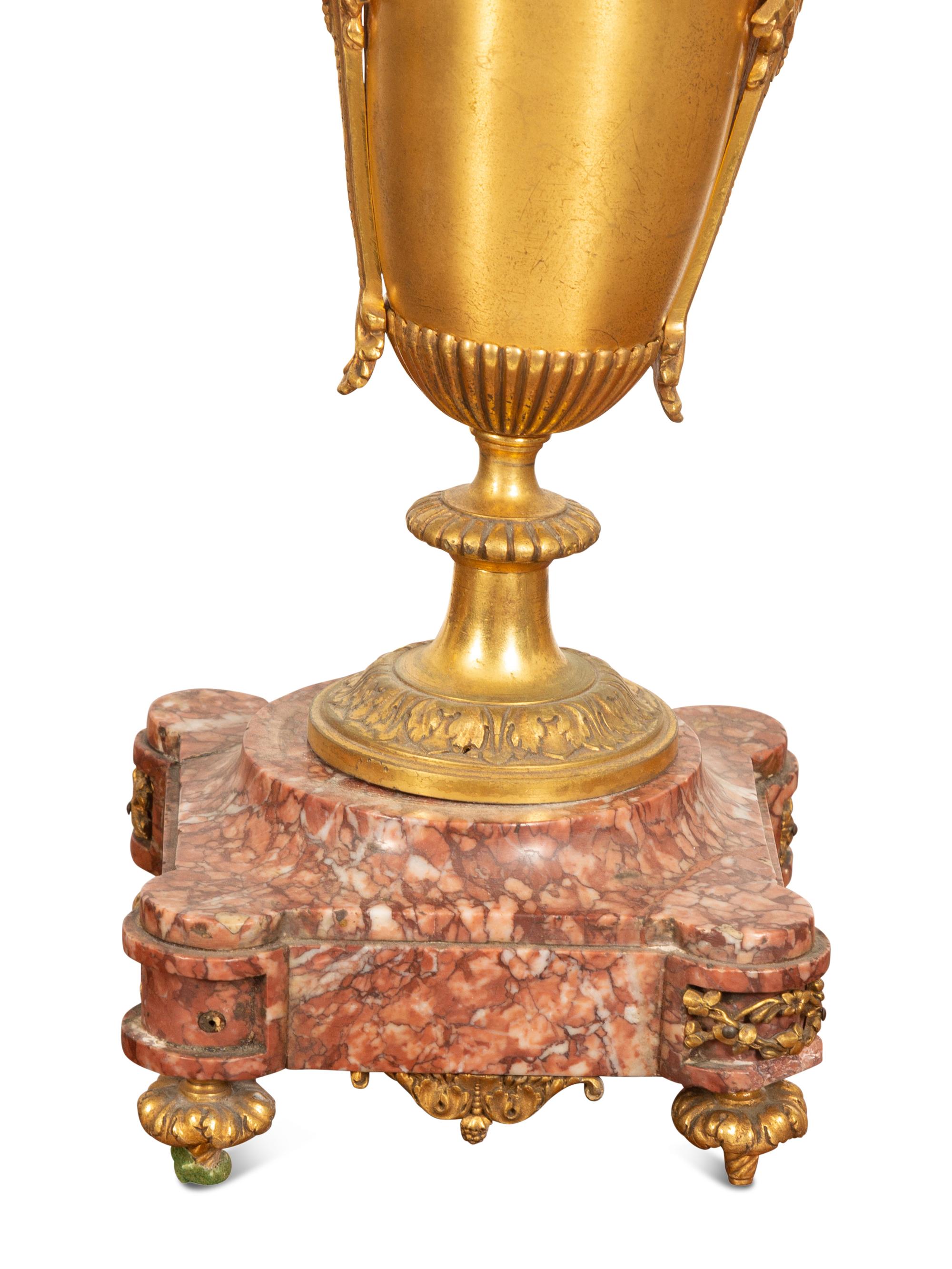 A Pair of Empire Style Six-Light Bronze Urn-form Candelabra
