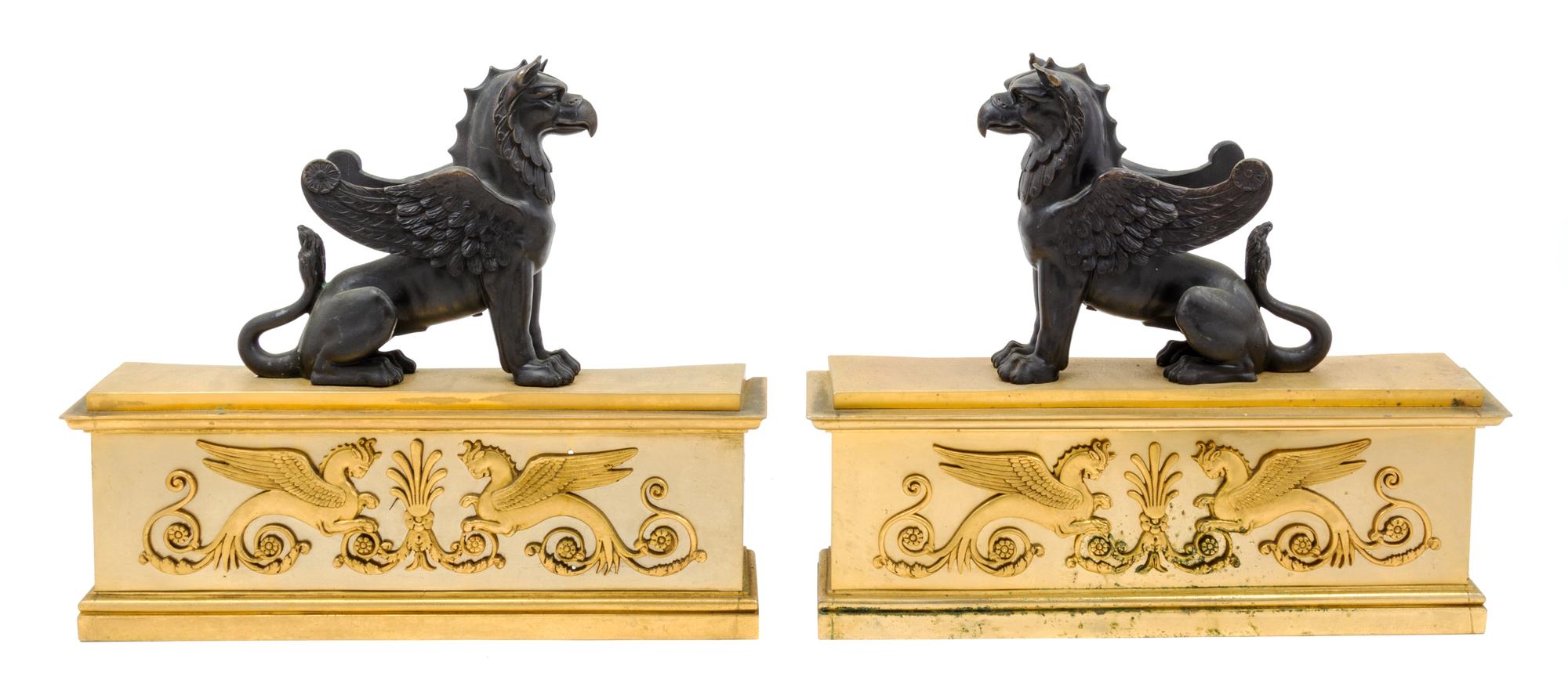 A Pair of Empire Style Gilt and Patinated Bronze Chenets Width 18 1/4 inches.