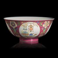 A Chinese Famille-Rose Ruby-Ground Sgraffito 'Medallion' Bowl, Daoguang Mark and of the Period — 清道光 內青花外粉彩軋道胭脂紅地開光五穀豐登博古紋碗