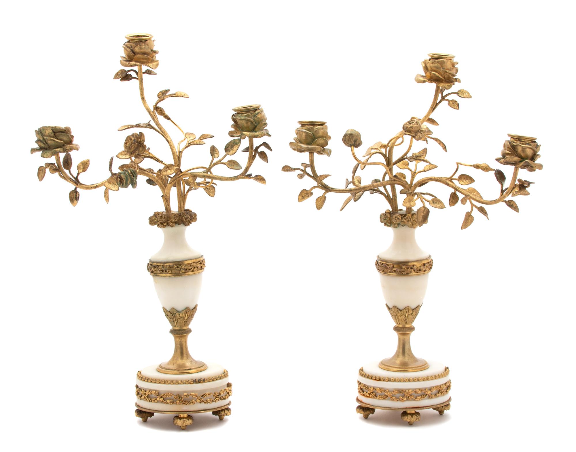 A Pair of French Gilt Bronze and Marble Two-Light Candelabra .
