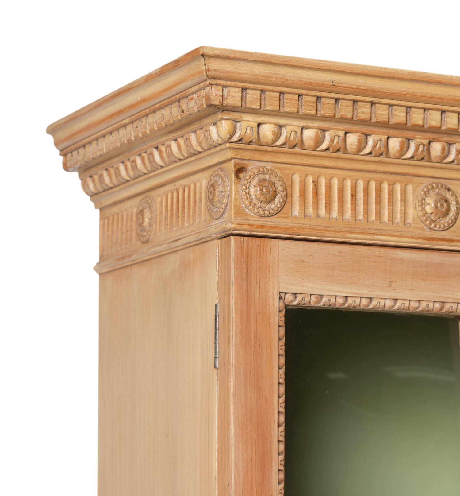 A George III Style Carved Pine Breakfront Bookcase