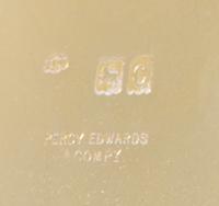 A Victorian Silver Box, Frederick Wright for Percy Edwards, London, 1898, of circular form with a hidden hinge lid, the exterior with e