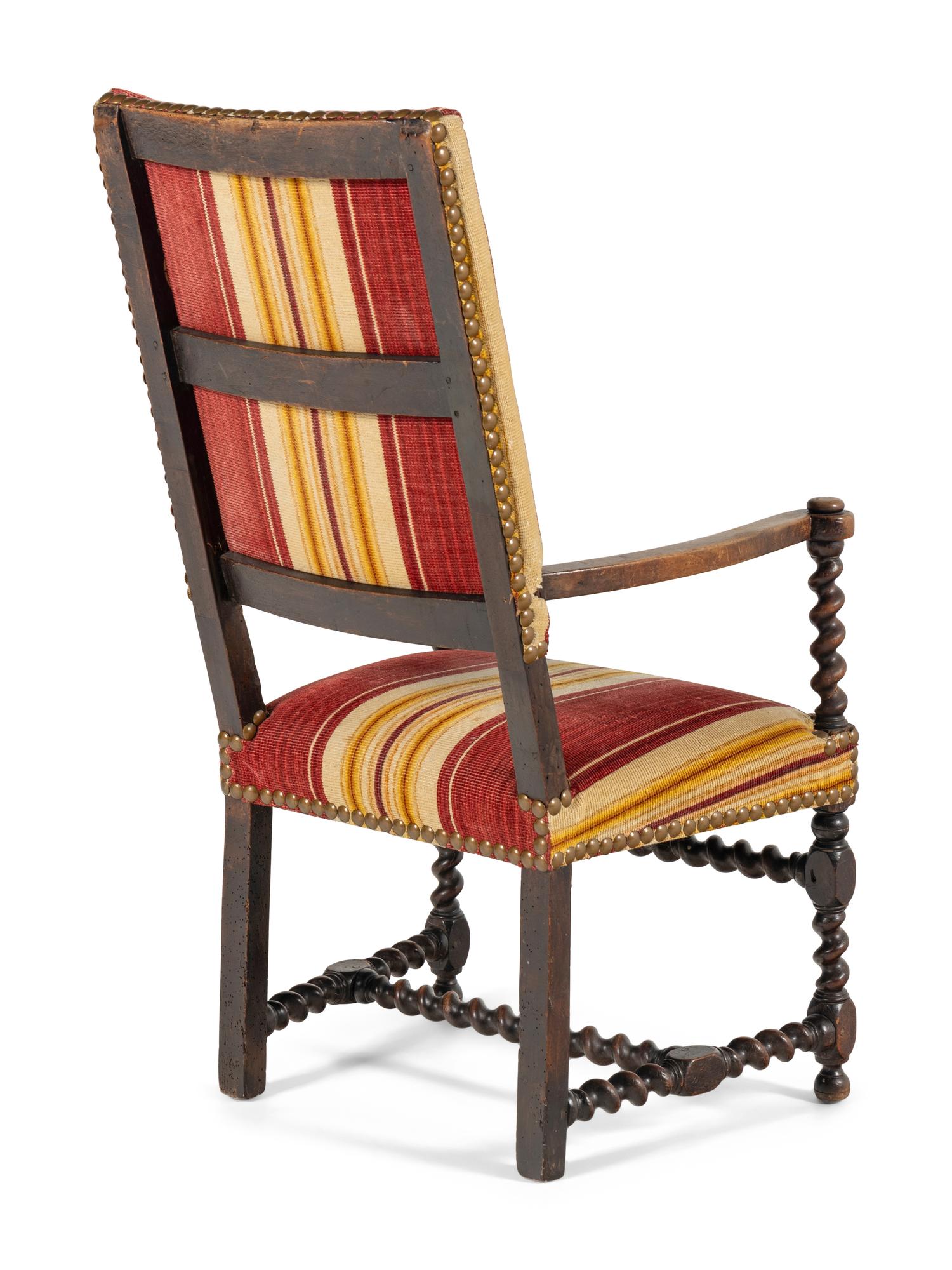 A William and Mary Style Carved Walnut Armchair